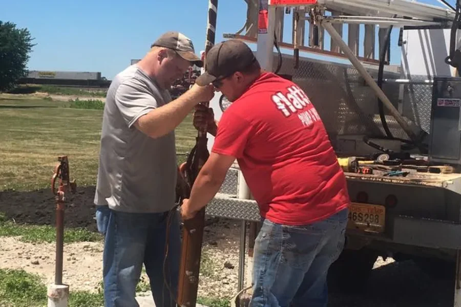 two men drilling